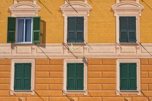 Italian colorful building with painted Plaster photo