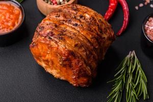 Delicious fresh smoked meat or ham with spices and herbs photo
