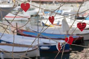 Love messages hanging on fisherman net photo