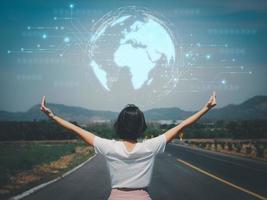 Global network connection in human hand Woman raising her hand showing the connection of technology from around the world energy saving photo