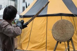 medieval archer shooting photo