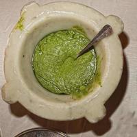 pesto sauce in marble mortar photo