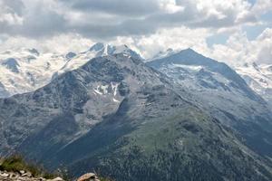 glider over swiss alps glacier view in Engadina photo