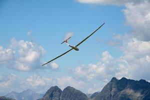 glider over swiss alps glacier view in Engadina photo