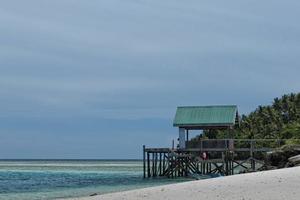 White Sand Beach in Turquoise Tropical Polynesian Paradise Palm photo