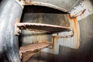 old rusted lighthouse winding stair in patagonia photo