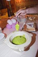 pesto sauce in marble mortar photo