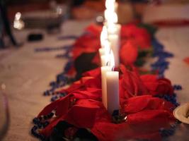 Christmas candles on the table photo