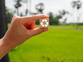 Recycle concept on wooden blocks, efficient use of resources. reuse and reuse photo