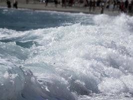 Sea wave on the shore photo