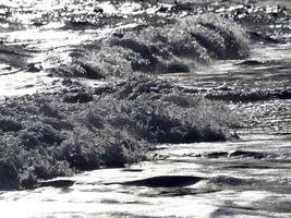 Sea wave on the shore photo