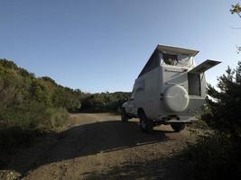 rv by the sea on backlight photo