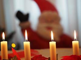 Christmas candles on the table photo