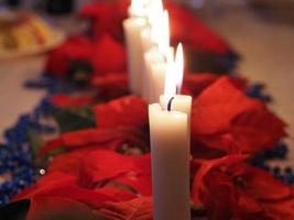 Christmas candles on the table photo