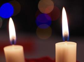 Christmas candles on the table photo