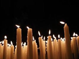 church votive candles white flames photo