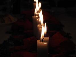 Christmas candles on the table photo