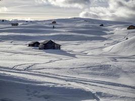 dolomites snow panorama wooden hut val badia armentarola photo