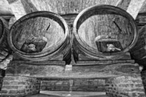 Wine Barrel in a cellar in black and white photo