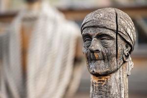 wood pirate face carved statue photo