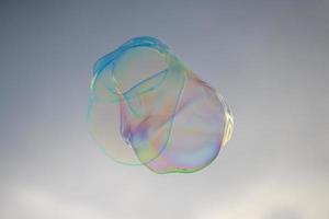 giant soap bubble rainbow colors photo