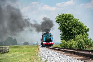 vapor motor tren mientras viniendo a usted foto