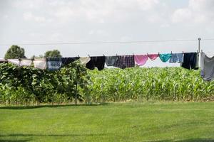 clothes hanging outside amish house in usa photo