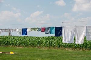 clothes hanging outside amish house in usa photo