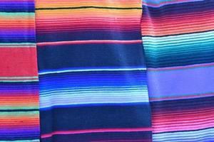 Different colors mexican fabric close up detail photo