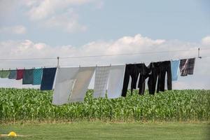 clothes hanging outside amish house in usa photo