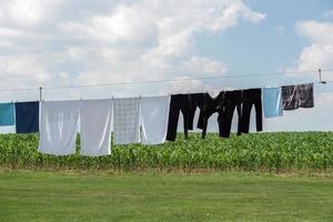 clothes hanging outside amish house in usa photo