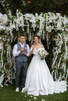 wedding ceremony of the newlyweds on the glade photo