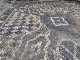 Varazze old medieval church cathedral Saint Ambrogio place sea stone made carpet photo