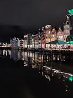 amsterdam canal at night view photo
