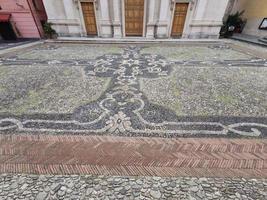 Varazze old medieval church cathedral Saint Ambrogio place sea stone made carpet photo