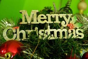 word of  Merry Christmas on the Christmas Tree photo