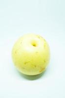 A Single Pear on White Background photo