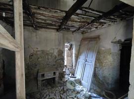 old abandoned roof collapsed farm house building in italy photo