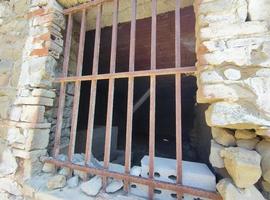 old abandoned roof collapsed farm house building in italy photo