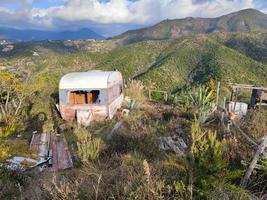 Old abandoned rusted roulotte Rv van photo