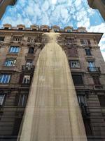 bride dress reflection on city buildings photo