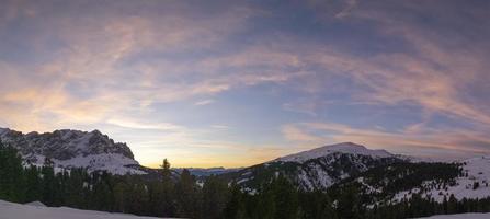 sunset on Dolomites mountains view from passo delle erbe Sass de putia  winter season photo