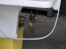 Small boat engine propeller photo