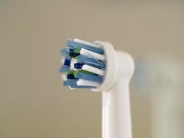 eléctrico cepillo de dientes detalle cerca arriba foto