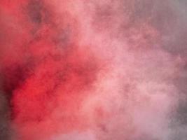 red smoke effect light background photo