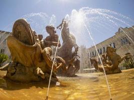 archimede place triton fountain syracuse photo