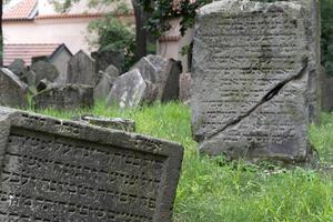 PRAGUE, CZECH REPUBLIC - JULY 17 2019 - jewish old cemetery in prague photo