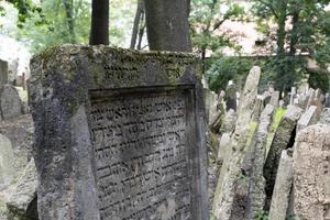 PRAGUE, CZECH REPUBLIC - JULY 17 2019 - jewish old cemetery in prague photo