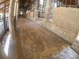 Ancient Roman mosaic of Villa del Casale, Sicily photo