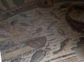 Ancient Roman mosaic of Villa del Casale, Sicily photo